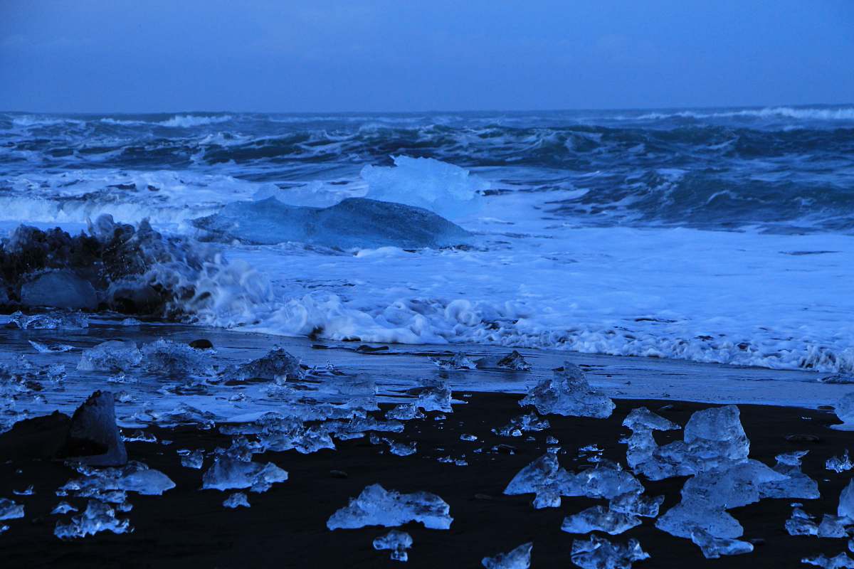 diamond beach photograph of water rushing on shore beach